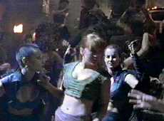 Gabrielle is suddenly over-dressed.