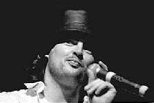I will now play the harmonica and sing folk songs