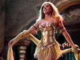 Don't panic! Xena's just pretending to be in a beauty
contest. 