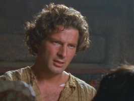 Xena tired of her warrior ways/When she first met Darius's gaze/She dressed up in blue/And drove a chariot, too/Then returned to her Gabrielle graze