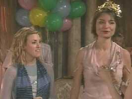 Maggie envies Lena's Queen for the Day accoutrements