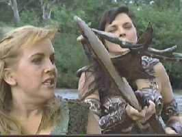 Xena threatens Gabrielle with a dead swordfish.
