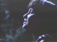 Her face artistically bathed in moonlight, Xena seeks clarification on the meaning of Season Five.