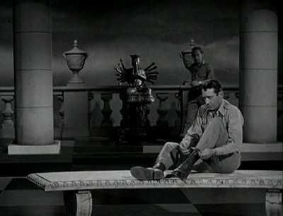 A man about to be sacrificed to the Aztec god Qezacotl performs the ritual shoe-tying